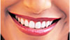 Dentist giving tips and advice on how  to take care of teeth